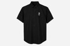 A black short-sleeve button-up shirt with a small white crown and 'M' logo on the left chest, displayed on a clean white background.