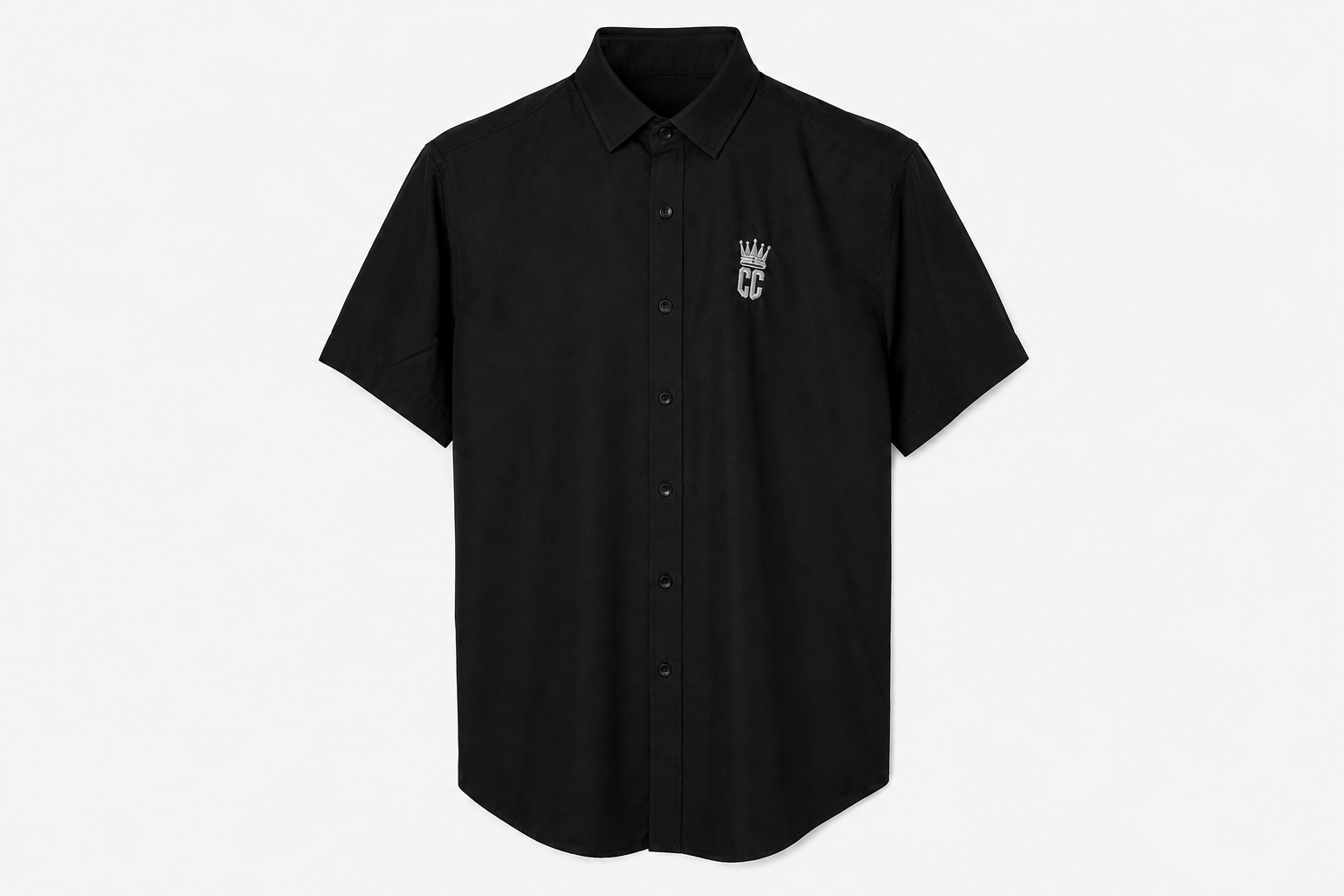 A black short-sleeve button-up shirt with a small white crown and 'M' logo on the left chest, displayed on a clean white background.